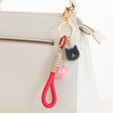 こはく黒ねこ赤風船飴のバッグチャーム